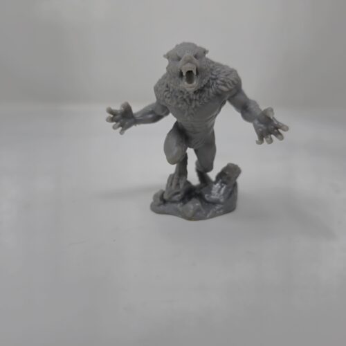 A snarling werewolf figure designed by Nyx Prints and 3D printed by PlastiForge3D, showcasing intricate fur and muscular detail through SLA resin technology.