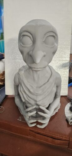 Unfinished life-size Dobby the elf model from Harry Potter, 3D printed using SLA resin, shown in raw gray resin form before final sanding and painting.
