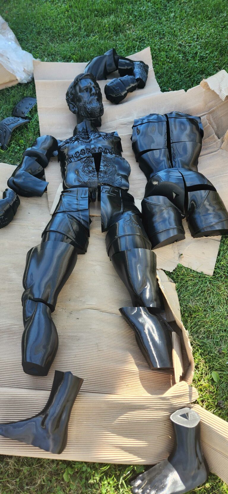 Connor McGregor lifesize custom statue 3D printed in multiple black PETG parts