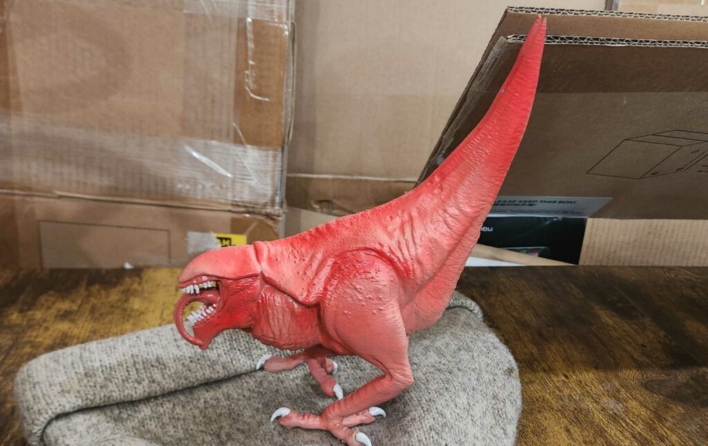 evisceral chicken printed and painted creature model with claws and open mouth