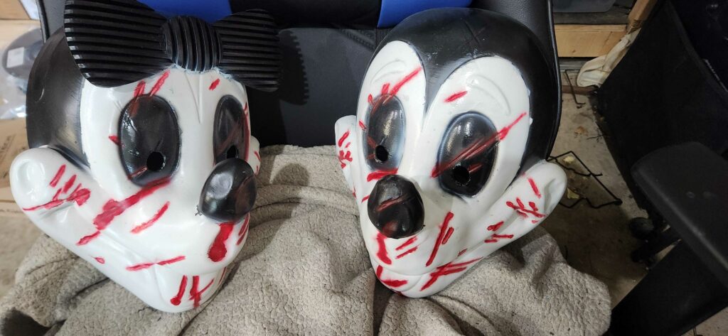 Mickey and Minnie Custom 3D printed masks with horror-style paint for Halloween