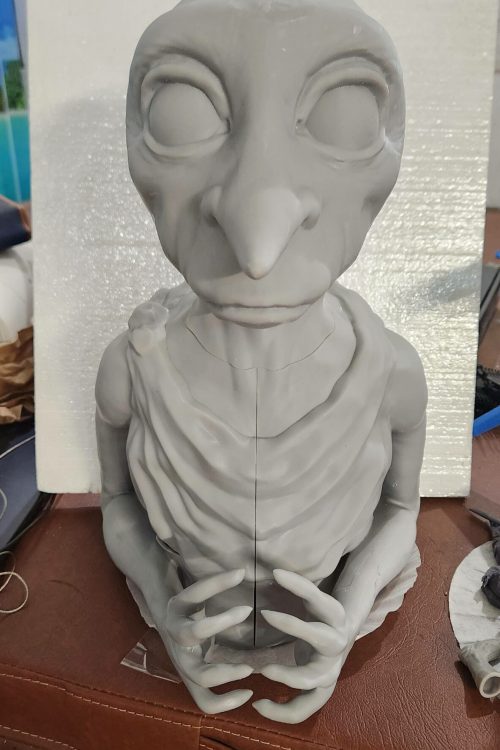 Unfinished life-size Dobby the elf model from Harry Potter, 3D printed using SLA resin, shown in raw gray resin form before final sanding and painting.
